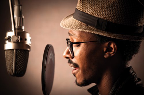 vocalist singing into a microphone