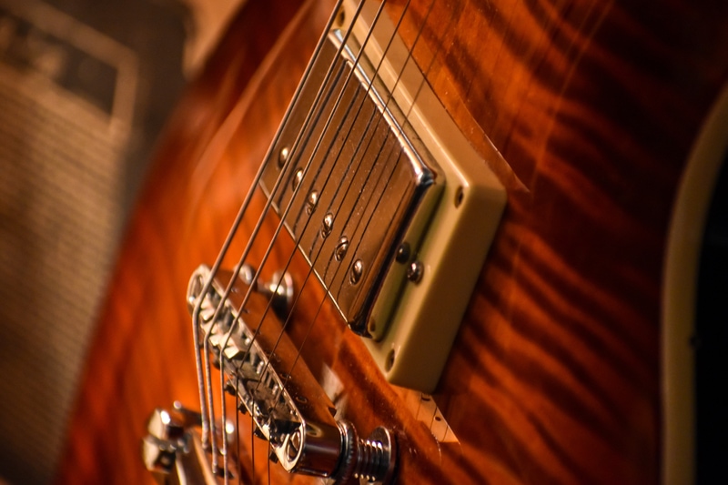 close up of a guitar pickup